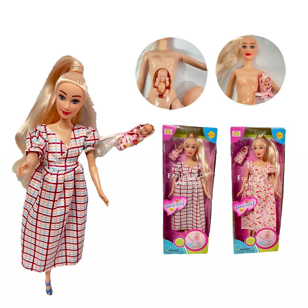 @Muñeca embarazada en caja